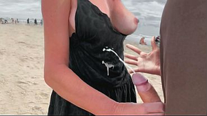 A mummy wank off a stranger on a public beach for a bet!