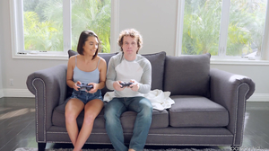 Short haired seductress distracts her gamer boyfriend