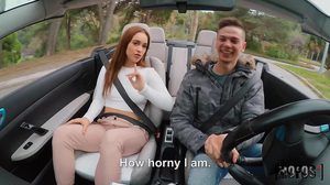 Redheaded gal shows her backseat riding skills