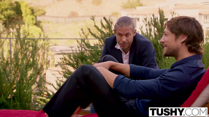 Flexible brunette is fucked by two men in a three way