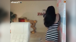 Cute Asian girl has great curves in a tight dress