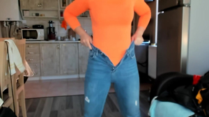 Slut with dyed hair is talking in front of the webcam