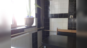 Girl keeps her leggings and high heels in the kitchen