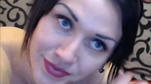 Blue eyed MILF fucks with a magic wand and a dildo